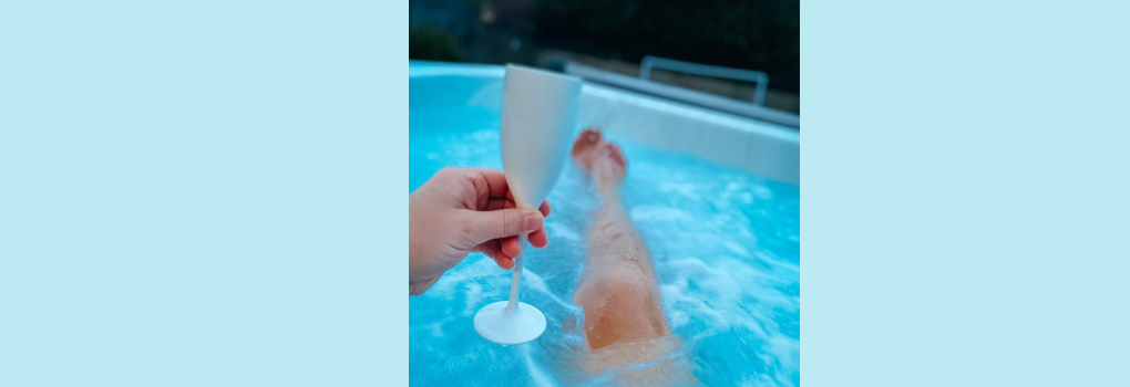 Hot tub relaxing with drink